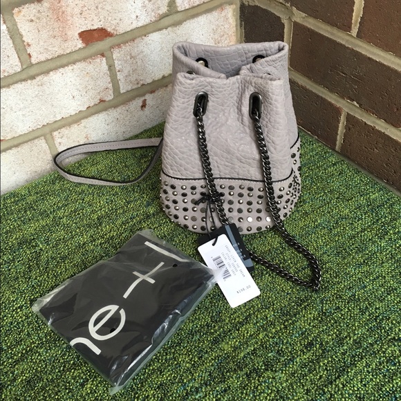 She+lol studded genuine leather bucket bag NWT