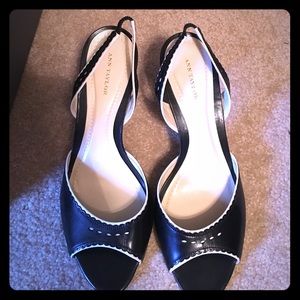 Black and white leather heels