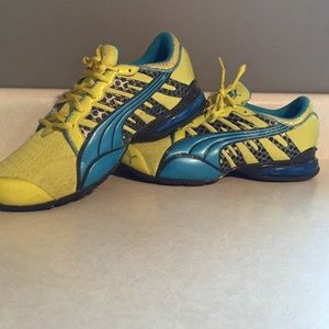 Blue and green Puma shoes