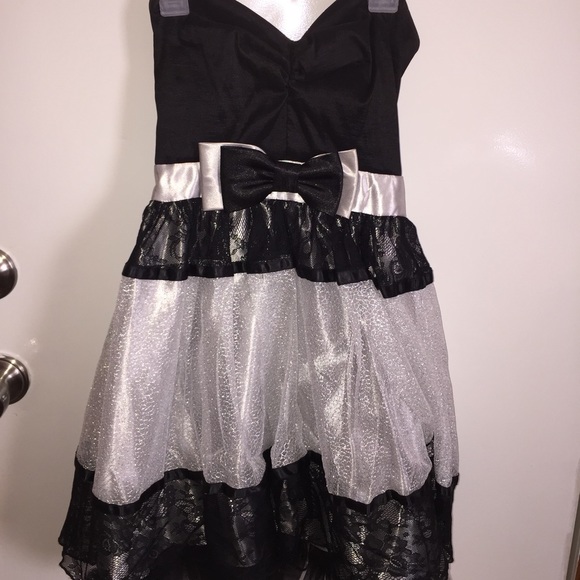 Above the knee strapless black and silver dress