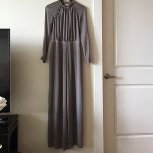 Embellished Neck Jumpsuit with sheer sleeves.