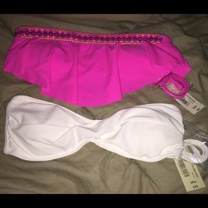Two brand new strapless bathing suit tops