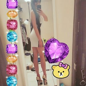 Sexy white dress with black lace details.