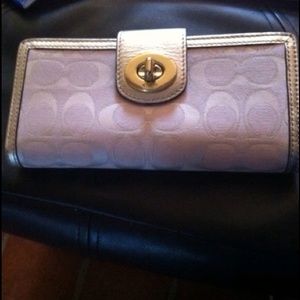 Like new pink coach wallet w/matching check cover