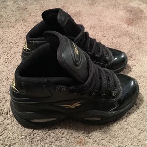 All black with a bit of gold Question shoes