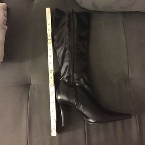Black tall heeled boots