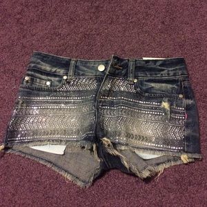 Pink cheeky cut off shorts