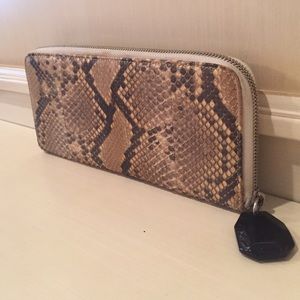 Python and onyx clutches
