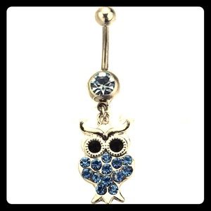 Blue crystal owl belly ring.