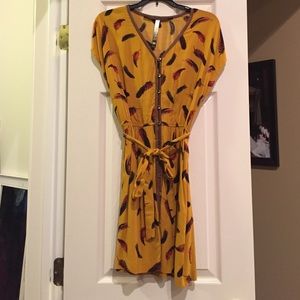Yellow Kensie dress with feather pattern