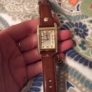 Michael Kors leather strap watch.