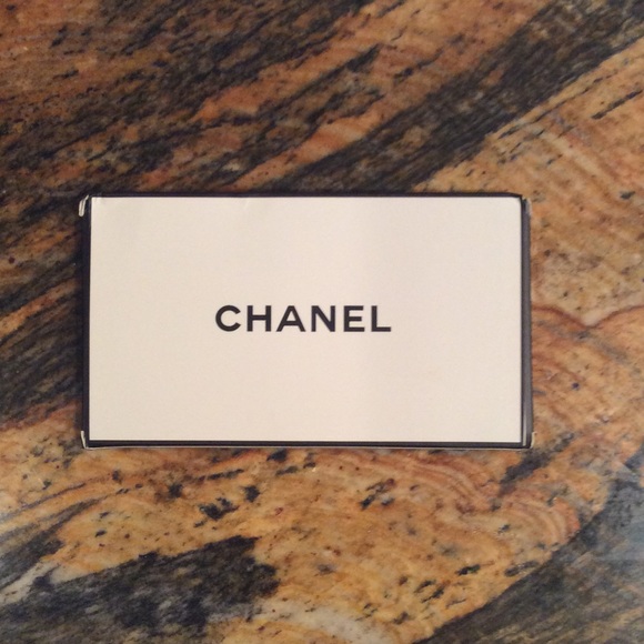 Chanel hand size mirror with box.