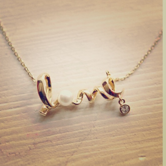 Gold "Love" necklace with rhinedstoned ball