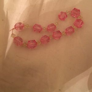 Pink and green beaded bracelet