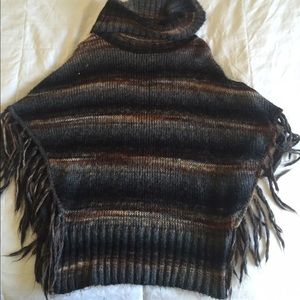 Fringed poncho sweater