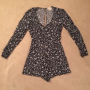 Floral long sleeved romper