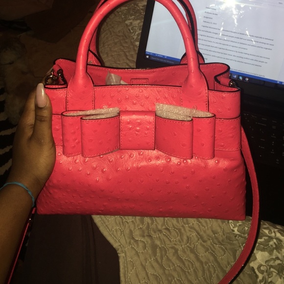 Kate and spade authentic purse has tag still