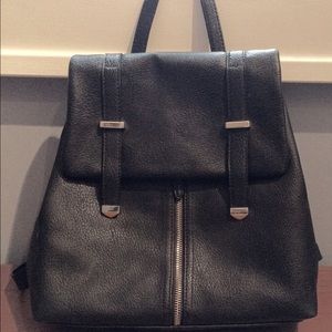 Charming Charlie faux leather convertible bag