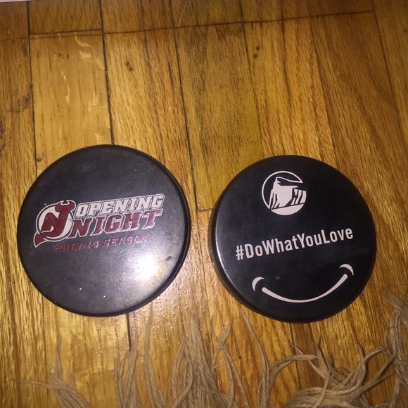 New Jersey Devils opening night hockey pucks