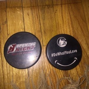 New Jersey Devils opening night hockey pucks