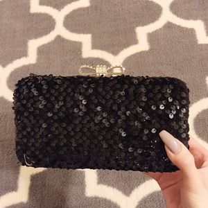 Black sequined clutch