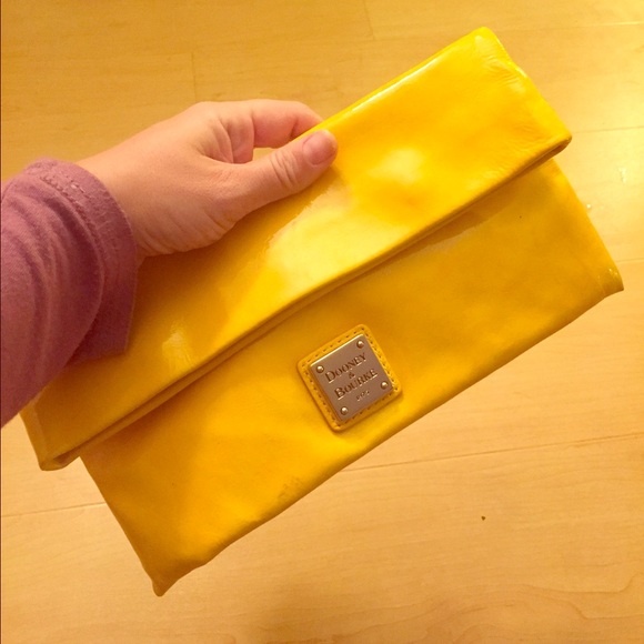 Dooney & Burke yellow patent leather clutch