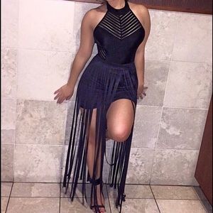 Black onesie top and flowy skirt.