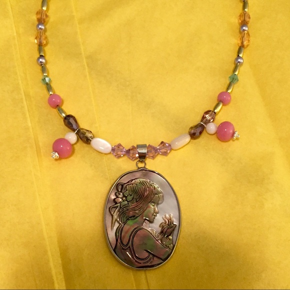 A abalone pendent necklace with girl.