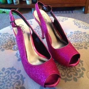 Bright pink, open toed sparkly slingback heels!