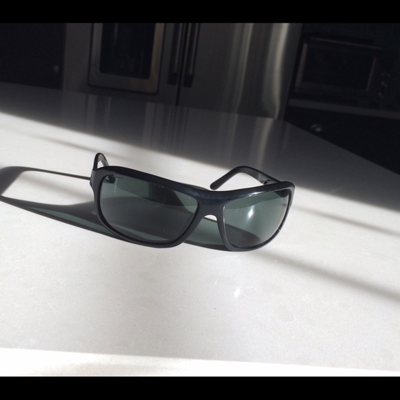 Women's Prada Sunglasses in Black.