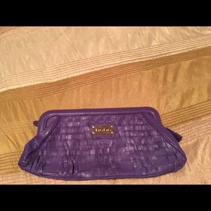 Bebe leather woven clutch in stunning purple