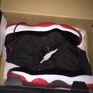 Youth Jordan "Bred" 11's size 6 1/2
