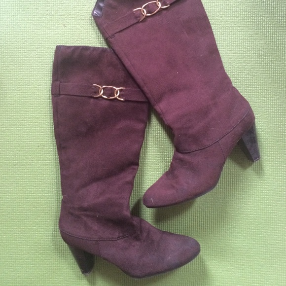 Brown suede boots with gold buckle
