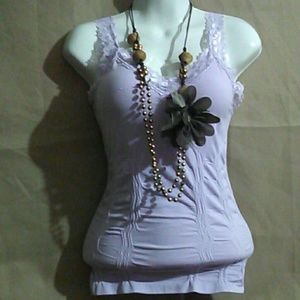 Nueva blusa de tirantes color moradita muy bonita