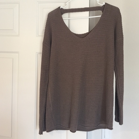 Knit sweater with open back