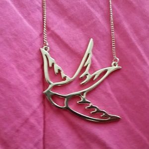 Gold bird necklace