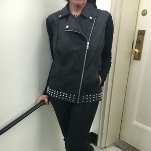 Black studded vest.