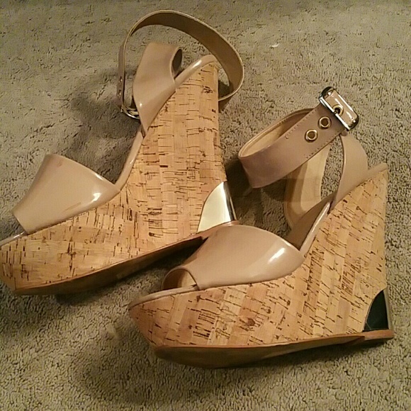 Nude wedges.