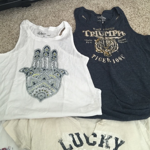A lot! Size xs lucky brand tops like new!