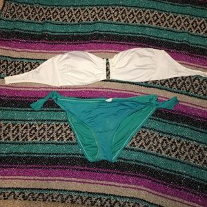 White swimsuit top and blue swimsuit bottom