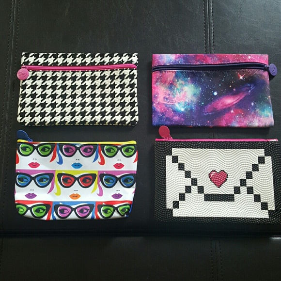 4 Ipsy makeup bags never used