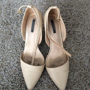 Point toe, ankle strap high heel