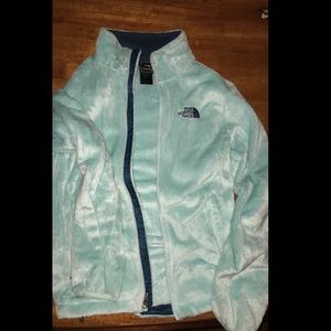 An ice blue worn once north face