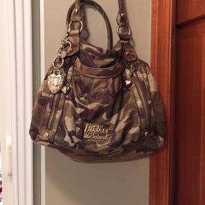 Kathy van Zeeland camo purse