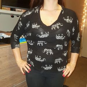 Black shirt with elephants