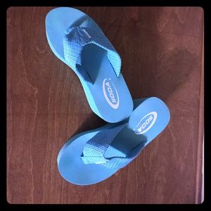 Turquoise flip flops