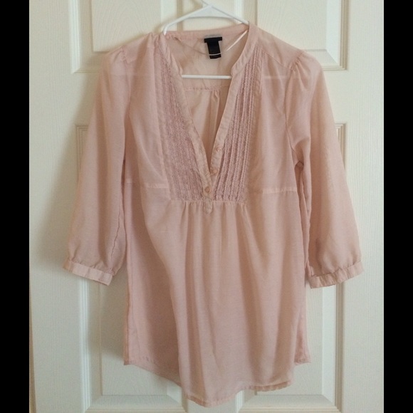 Light pink blouse.
