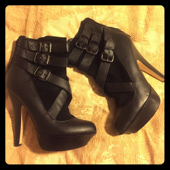 Bebe black leather booties used but almost new