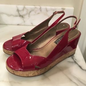 Red patent leather wedges