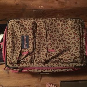 Jansport Animal Print Suitcase with wheels. Great